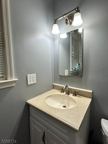 703 Nottingham Way, Raritan Twp, NJ 08822 - bathroom featuring vanity and toilet