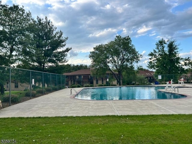 703 Nottingham Way, Raritan Twp, NJ 08822 - community pool featuring a patio area