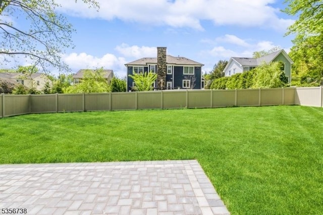 view of yard with a patio area