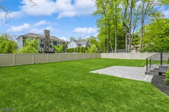view of yard with a patio
