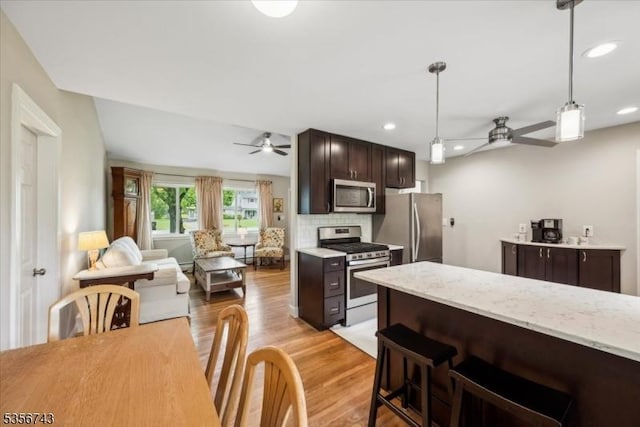 6 Cumberland Rd, Hillsborough Twp, NJ 08844 - kitchen with appliances with stainless steel finishes, ceiling fan, dark brown cabinetry, light wood-style flooring, and recessed lighting