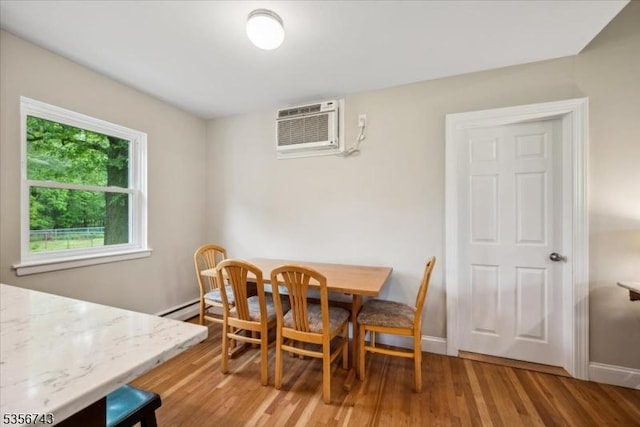 6 Cumberland Rd, Hillsborough Twp, NJ 08844 - dining room with an AC wall unit, light wood-style flooring, and baseboards