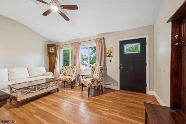 6 Cumberland Rd, Hillsborough Twp, NJ 08844 - entryway featuring lofted ceiling, baseboard heating, plenty of natural light, ceiling fan, and light wood-style floors