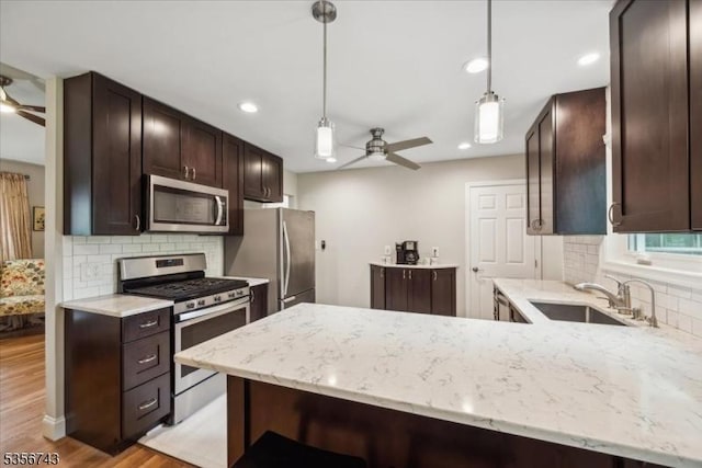 6 Cumberland Rd, Hillsborough Twp, NJ 08844 - kitchen featuring a ceiling fan, stainless steel appliances, a sink, dark brown cabinets, and recessed lighting