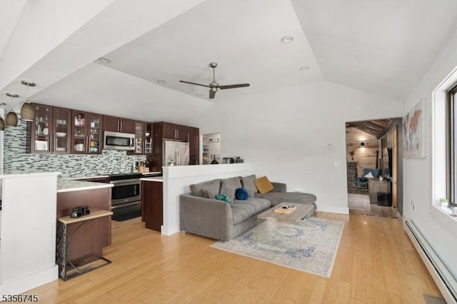 229A Squaw Trl, Hopatcong Boro, NJ 07821 - living room featuring a baseboard heating unit, lofted ceiling, light wood-style flooring, and ceiling fan