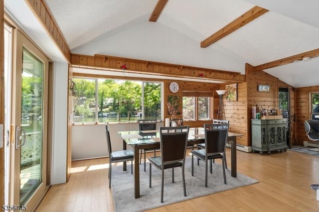 229A Squaw Trl, Hopatcong Boro, NJ 07821 - dining space with light wood-style floors, wood walls, and baseboard heating