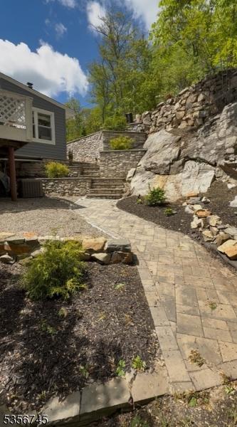 229A Squaw Trl, Hopatcong Boro, NJ 07821 - view of yard featuring a patio area
