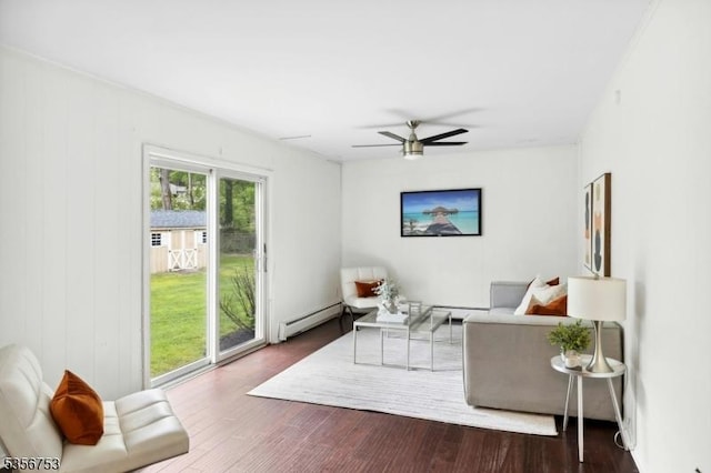 9 Copperfield Rd, Scotch Plains Twp, NJ 07076 - living area featuring baseboard heating, ceiling fan, and wood finished floors