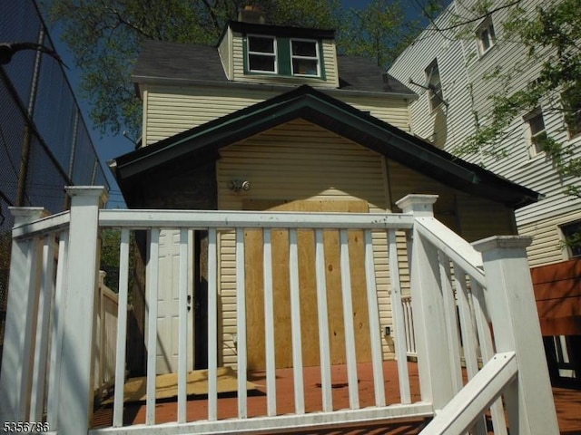 view of home's exterior with a deck
