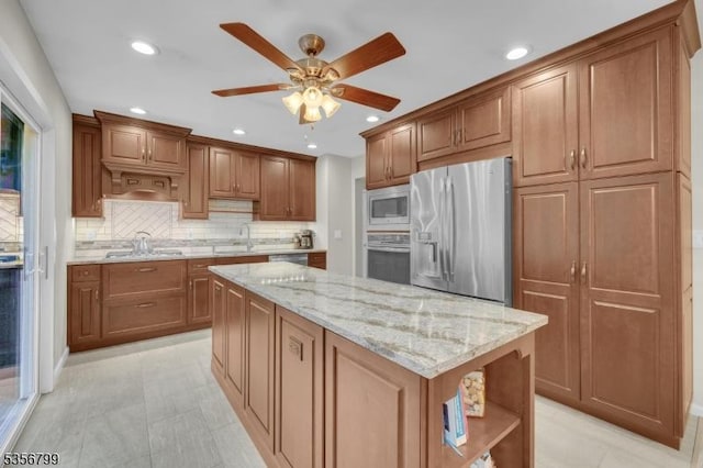 38 Nestlingwood Dr, Washington Twp, NJ 07853 - kitchen featuring stainless steel appliances, a center island, open shelves, light stone countertops, and recessed lighting