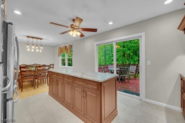 38 Nestlingwood Dr, Washington Twp, NJ 07853 - kitchen featuring freestanding refrigerator, ceiling fan, recessed lighting, light stone counters, and light tile patterned floors