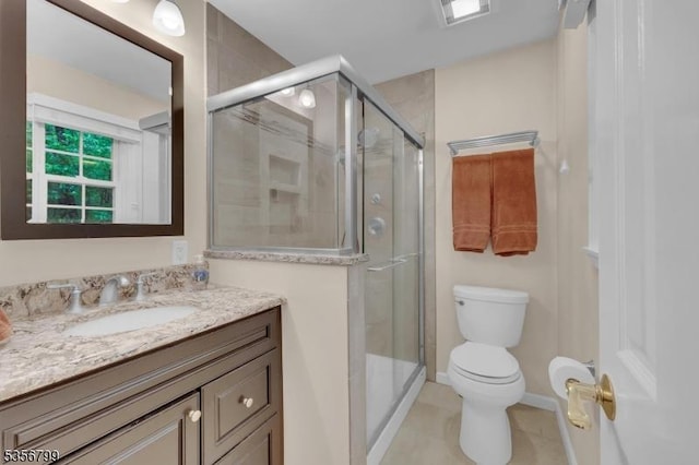 38 Nestlingwood Dr, Washington Twp, NJ 07853 - bathroom featuring toilet, vanity, a stall shower, tile patterned flooring, and baseboards