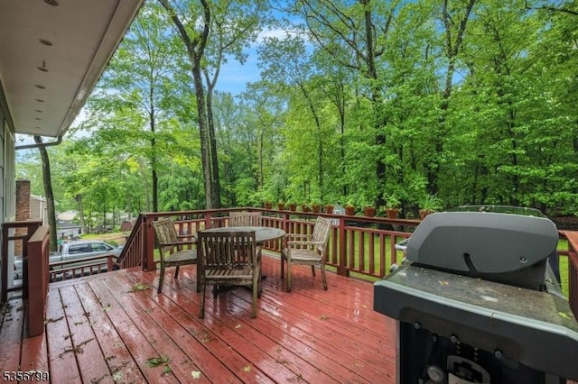 38 Nestlingwood Dr, Washington Twp, NJ 07853 - wooden terrace with outdoor dining space and a grill