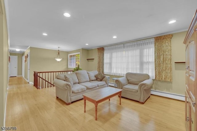 38 Nestlingwood Dr, Washington Twp, NJ 07853 - living area with a baseboard radiator, light wood-style floors, recessed lighting, ornamental molding, and baseboard heating