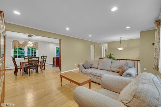 38 Nestlingwood Dr, Washington Twp, NJ 07853 - living room with light wood finished floors, recessed lighting, crown molding, baseboards, and a chandelier