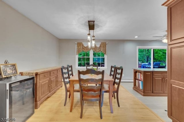 38 Nestlingwood Dr, Washington Twp, NJ 07853 - dining space with beverage cooler, light wood-type flooring, healthy amount of natural light, and recessed lighting