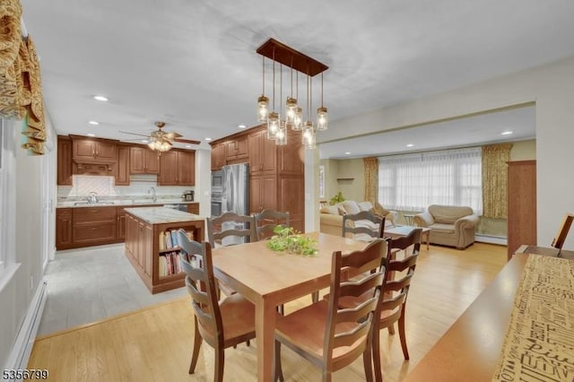38 Nestlingwood Dr, Washington Twp, NJ 07853 - dining room featuring a baseboard radiator, a ceiling fan, light wood-style floors, and recessed lighting