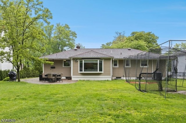 96 Belmont Ave, Cranford Twp, NJ 07016 - back of house with a lawn, a patio, a chimney, and central AC
