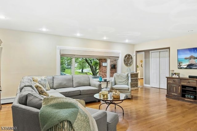 96 Belmont Ave, Cranford Twp, NJ 07016 - living room featuring light wood finished floors, a baseboard radiator, and recessed lighting