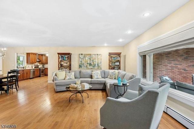 96 Belmont Ave, Cranford Twp, NJ 07016 - living area with a baseboard radiator, light wood-style flooring, a chandelier, and recessed lighting