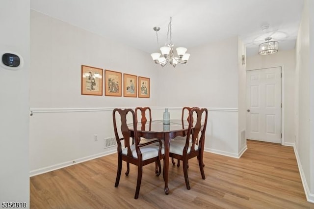 804 Appleton Way, Hanover Twp, NJ 07981 - dining area featuring a chandelier, wood finished floors, and baseboards