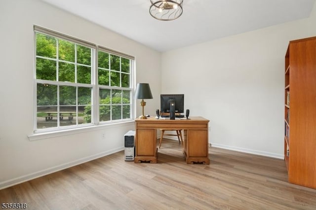 804 Appleton Way, Hanover Twp, NJ 07981 - office area featuring light wood finished floors, baseboards, and a chandelier