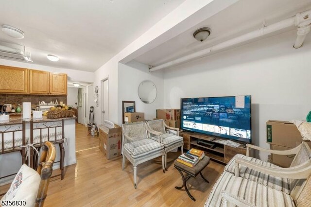 7505 Palisade Ave, North Bergen Twp, NJ 07047 - living room featuring light wood-type flooring