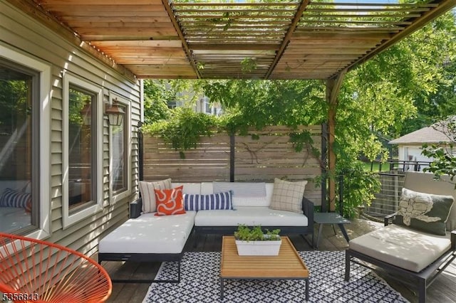 view of patio / terrace with fence and an outdoor living space
