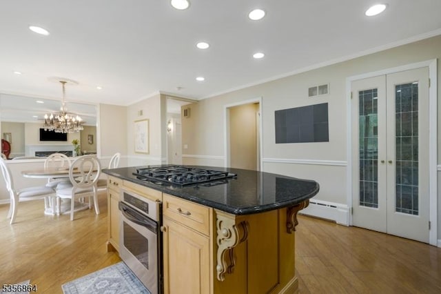 147 Liberty Corner Rd, Bernards Twp, NJ 07920 - kitchen featuring oven, black gas cooktop, crown molding, french doors, and light wood-type flooring