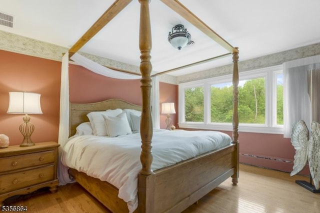147 Liberty Corner Rd, Bernards Twp, NJ 07920 - bedroom with light wood-style flooring and baseboard heating