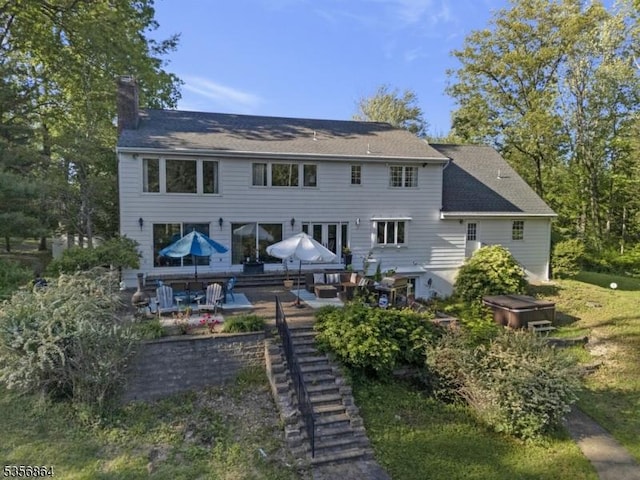 147 Liberty Corner Rd, Bernards Twp, NJ 07920 - rear view of property with a chimney and a patio
