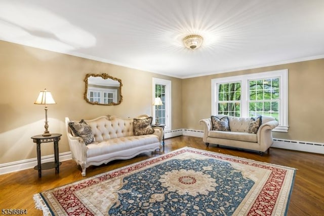 147 Liberty Corner Rd, Bernards Twp, NJ 07920 - living room featuring crown molding, wood finished floors, baseboards, and a baseboard heating unit