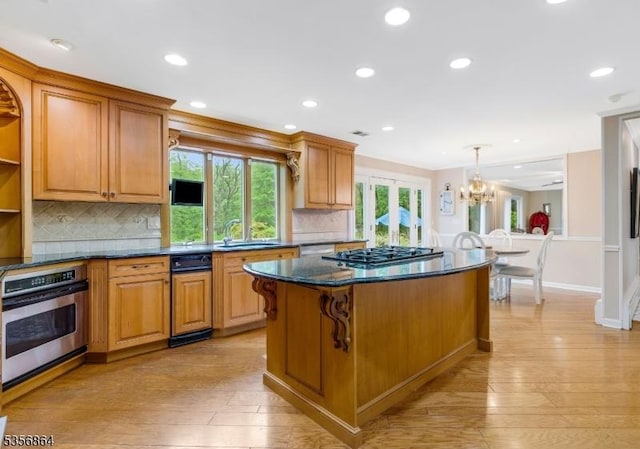 147 Liberty Corner Rd, Bernards Twp, NJ 07920 - kitchen with stainless steel oven, gas stovetop, backsplash, light wood-style floors, and a chandelier
