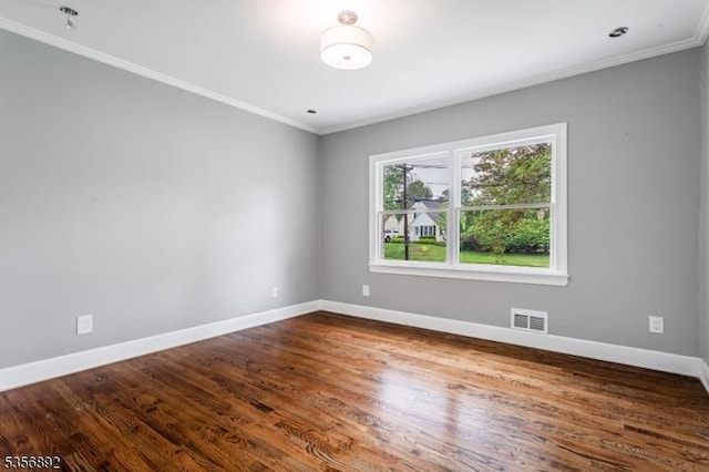 1673 Raritan Rd, Clark Twp, NJ 07066 - spare room featuring crown molding, baseboards, and wood finished floors