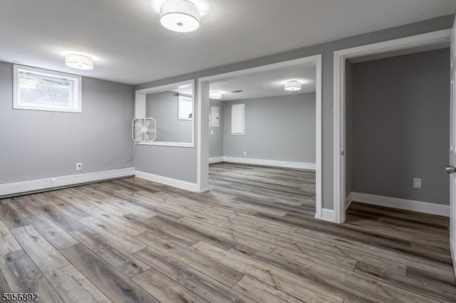 1673 Raritan Rd, Clark Twp, NJ 07066 - basement with wood finished floors and baseboards