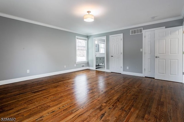 1673 Raritan Rd, Clark Twp, NJ 07066 - unfurnished bedroom with dark wood-type flooring, baseboards, crown molding, and ensuite bath