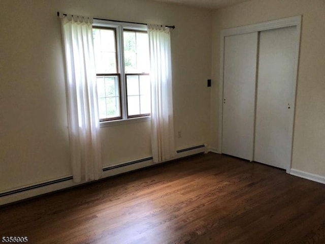 89 Ridge Rd, Jefferson Twp, NJ 07438 - unfurnished bedroom featuring wood finished floors, baseboards, and a closet