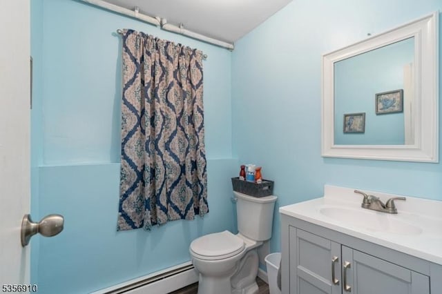 8 Hillside Ter, Green Twp, NJ 07821 - bathroom with a baseboard heating unit, toilet, and vanity