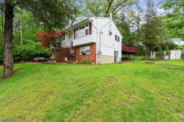 8 Hillside Ter, Green Twp, NJ 07821 - view of side of property featuring a lawn, brick siding, stairway, and a deck