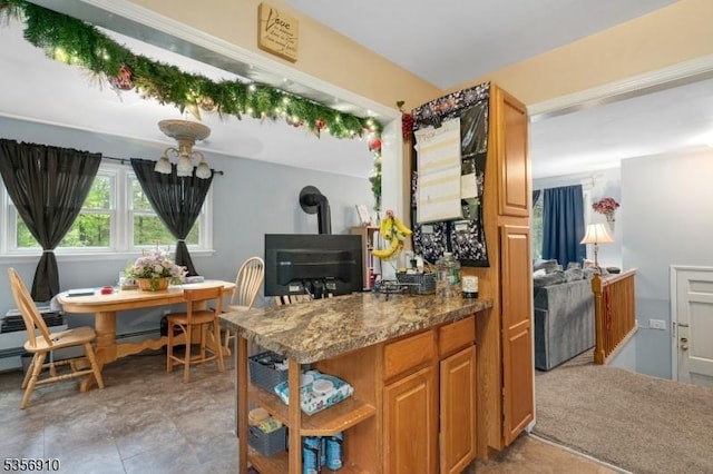 8 Hillside Ter, Green Twp, NJ 07821 - kitchen featuring a wood stove, open shelves, and brown cabinetry