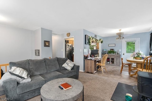 8 Hillside Ter, Green Twp, NJ 07821 - living area featuring an office area, a chandelier, and light colored carpet