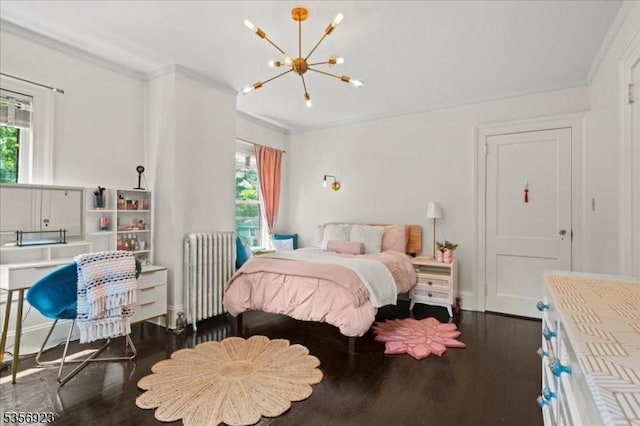 12 Harrison Ave, Montclair Twp, NJ 07042 - bedroom with radiator heating unit, crown molding, wood finished floors, and a chandelier