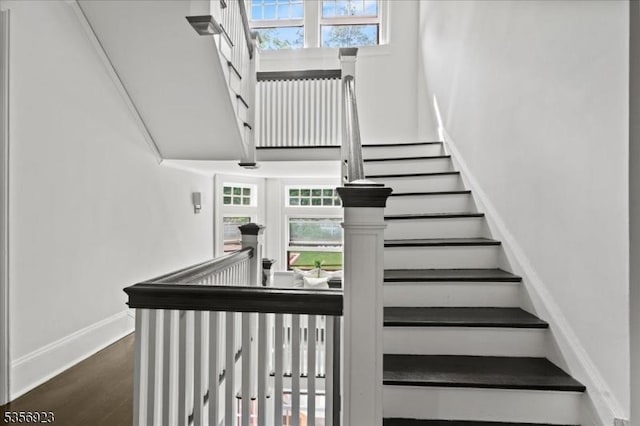 12 Harrison Ave, Montclair Twp, NJ 07042 - staircase with wood finished floors and baseboards