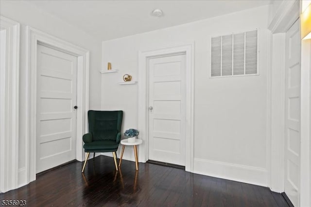 12 Harrison Ave, Montclair Twp, NJ 07042 - living area featuring dark wood-style flooring and baseboards