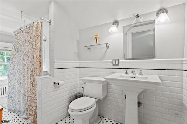 12 Harrison Ave, Montclair Twp, NJ 07042 - full bathroom with toilet, a wainscoted wall, tile walls, and curtained shower