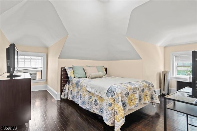12 Harrison Ave, Montclair Twp, NJ 07042 - bedroom featuring multiple windows, baseboards, wood finished floors, and lofted ceiling