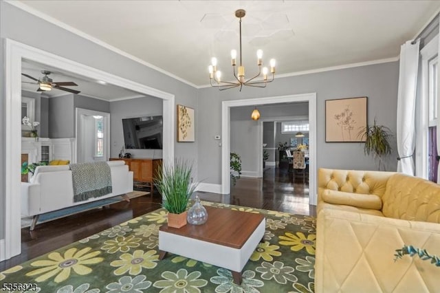 12 Harrison Ave, Montclair Twp, NJ 07042 - living area with healthy amount of natural light, wood finished floors, a chandelier, and ornamental molding