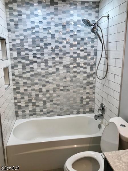 10 Evergreen Rd, Franklin Twp, NJ 08873 - bathroom featuring toilet, vanity, and bathtub / shower combination
