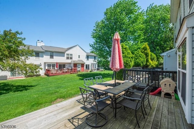 269 Edgeware Ct, Franklin Twp, NJ 08873 - deck with outdoor dining area and a yard