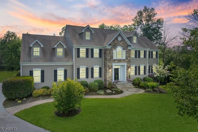 28 Handler Ct, Montgomery Twp, NJ 08502 - colonial home featuring stone siding and a front lawn